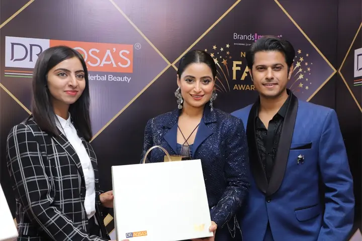 Dr. Aqsa gifting Neil Bhatt & Aishwarya Sharma